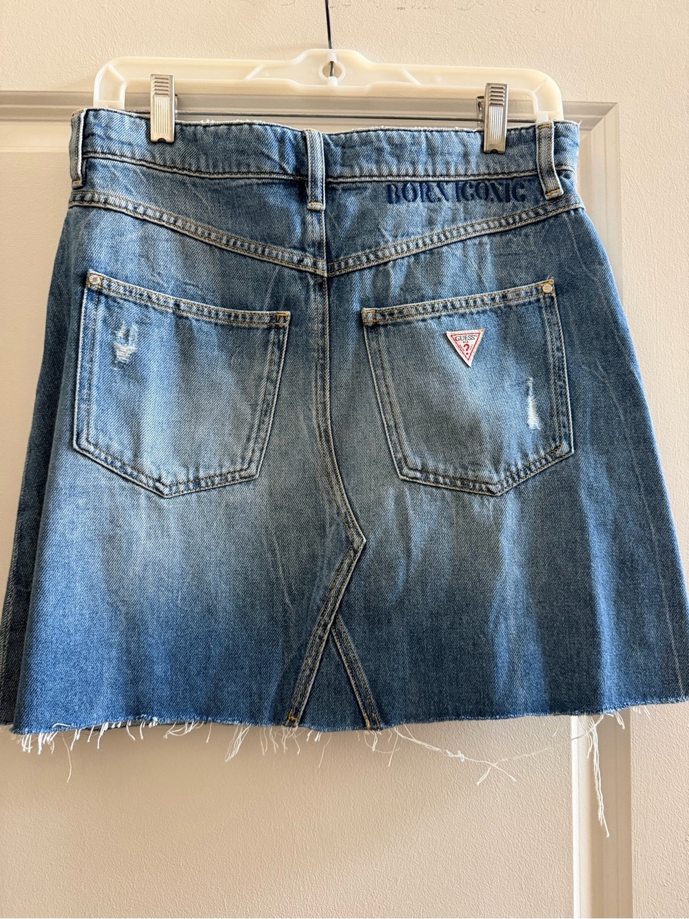 Guess Denim Mini Skirt in Medium Blue with Distressed Hem